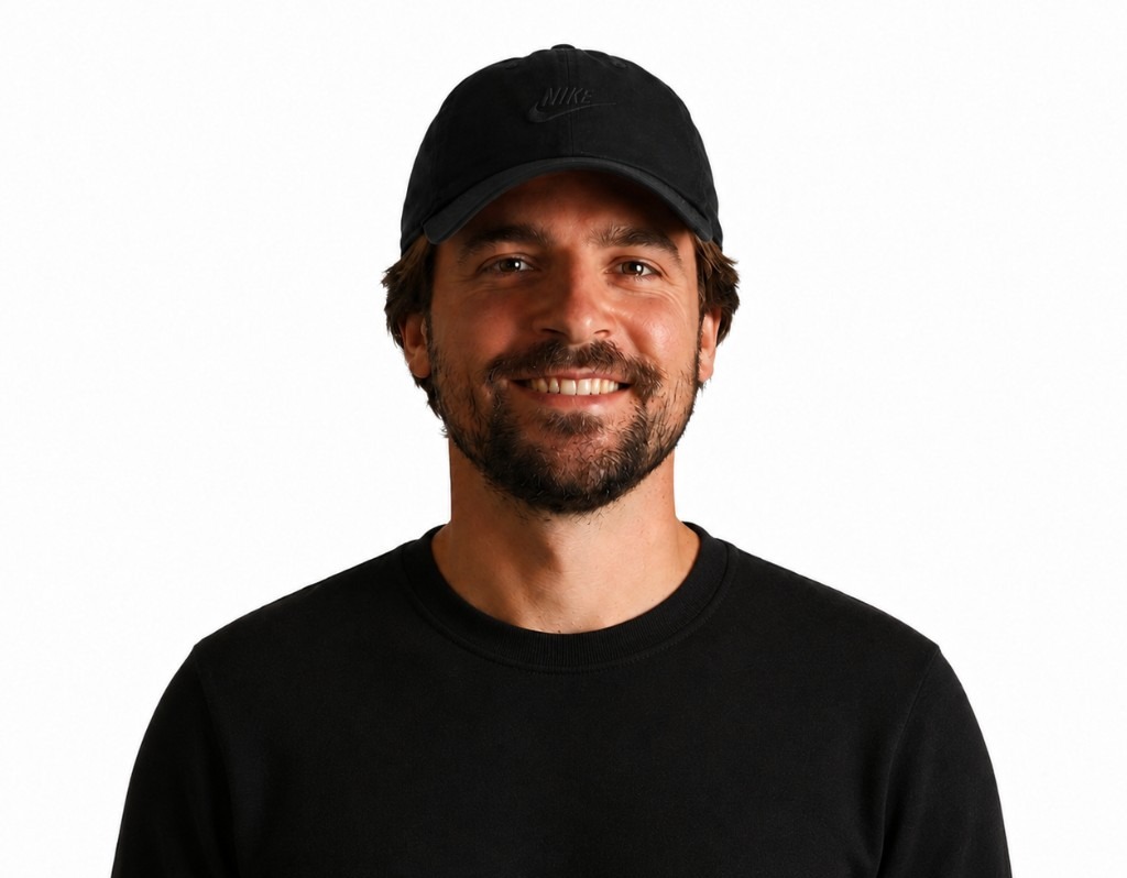 Macklin Buckler, studio portrait, smiling at the camera.